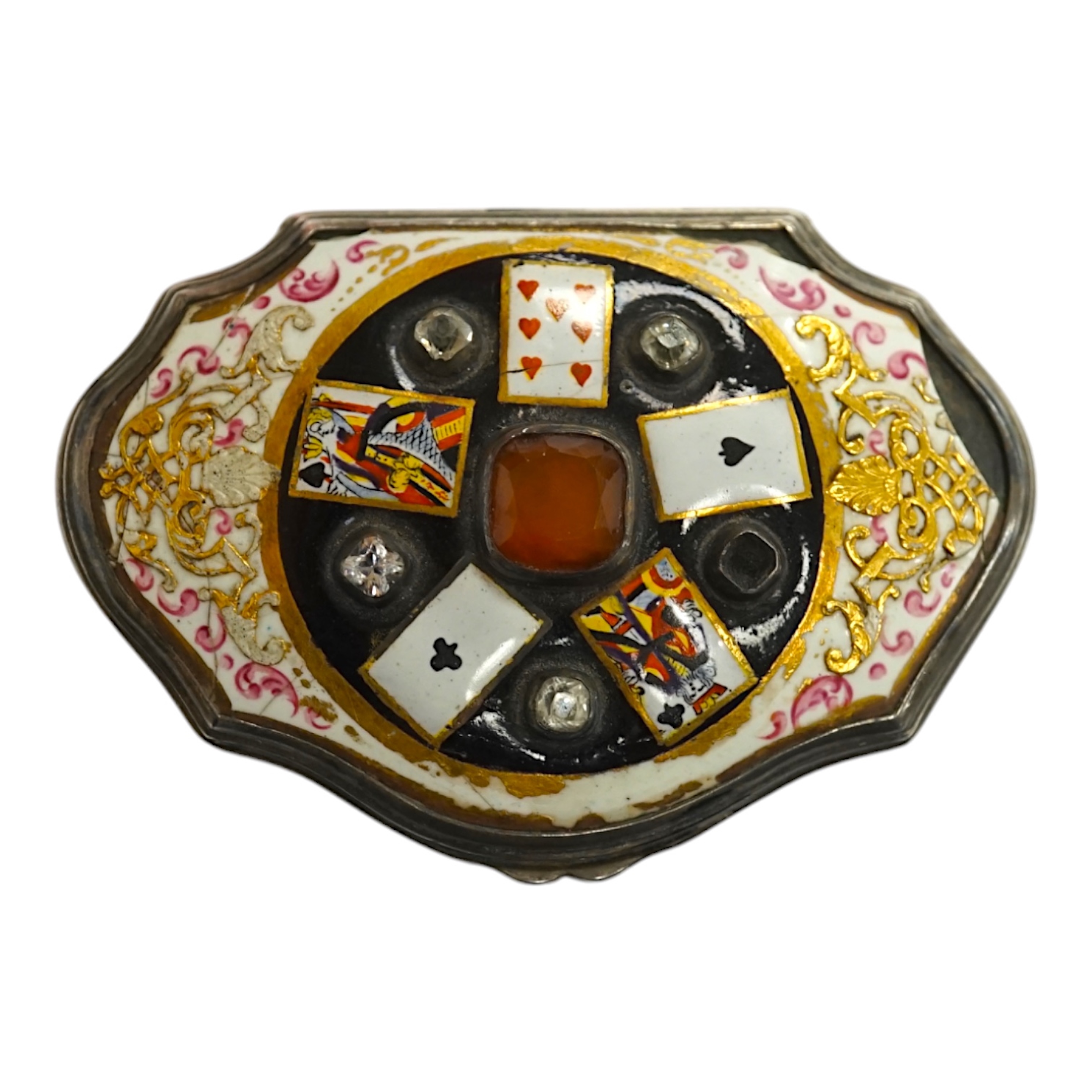 A continental white metal, enamel and two colour paste? set shaped oval snuff box, decorated with playing cards, unmarked, 67mm. Condition - poor